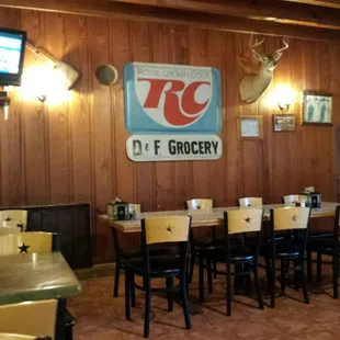 The dining room has a couple of televisions.