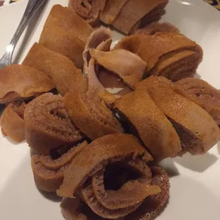 Kategna appetizer: injera with spices and berbere (red paste) and butter.