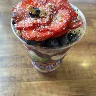 strawberries and blueberries in a cup