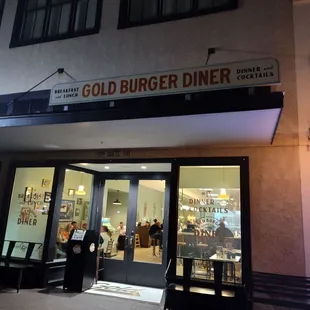 The cold and dreary night made the illuminated Gold Burger Diner storefront reminiscent of the iconic Nighthawks painting but happier!