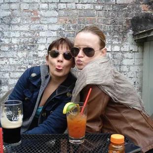 two women sitting at a table