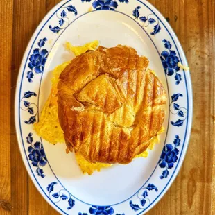 Croissant Egg &amp; Cheese with Turkey bacon and hash browns