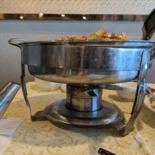 Spicy chicken wing with fire underneath