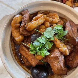 Clay pot cod with mushrooms