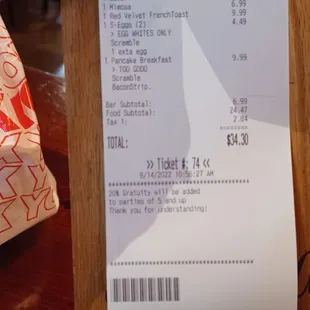 The bill, with the steak meal complimented.