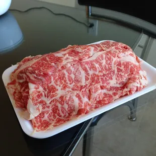 Fatty, super thin-sliced hotpot beef at $13/lb. Hard to beat.