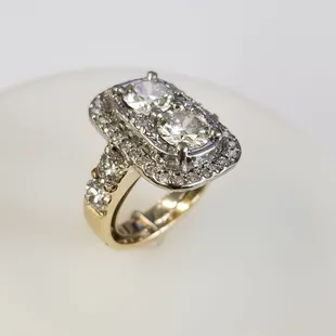 Custom ring utilizing customer's diamonds