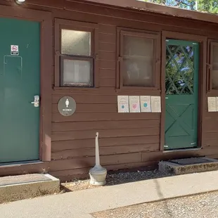 Outside of bathrooms near sites 44 &amp; 51. Key code required for entry (provided at check in).