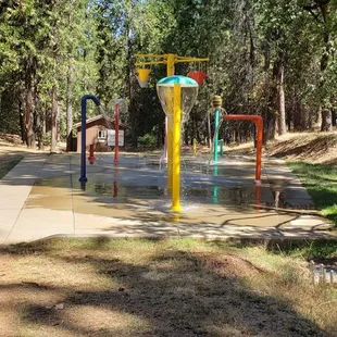 Splash park.  Recirculated water, so don't drink it! Lots of butterflies in this area.