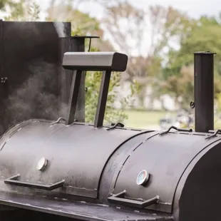 smoke coming out of the grill