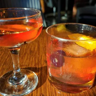 two cocktails on a table