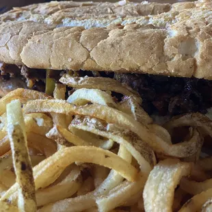 Philly cheese and Curly Fries