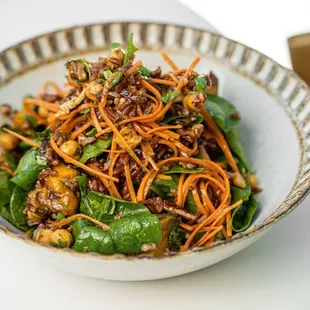 vegan bowl + roasted kabucha squash + chickpea + carrot + spinach + red cargo rice + toasted pecan + creamy harissa vinaigrette