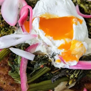 Loaded latke with poached egg, extra broccolini no mushrooms