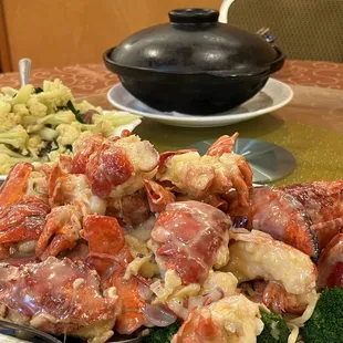 Lobster with cheese sauce over yee main noodles