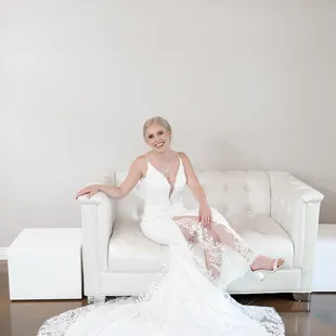 Bridal suite, full of mirrors with a beautiful white couch for bridal photos.