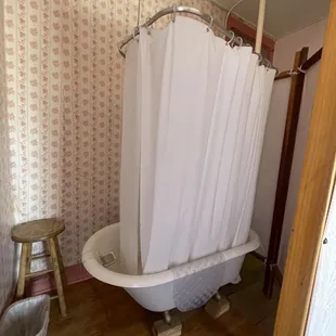 One of the shower/tubs upstairs