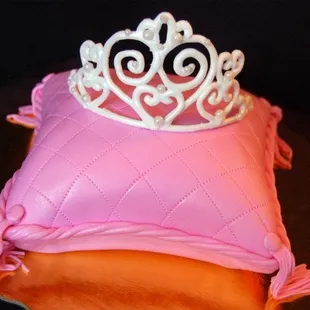 princess tiara on a fluffy pink pillow -- wait that pillow is a cake!