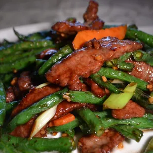 a plate of stir fried vegetables