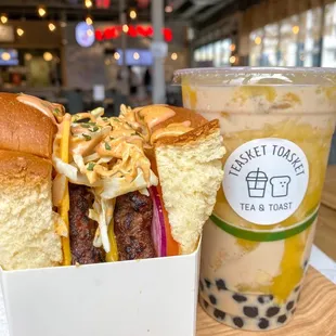 Burger Toast alongside Mango Milk Tea
