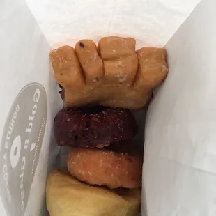 Top to bottom: Blueberry bear claw, red velvet, strawberry (AMAZING), and plain