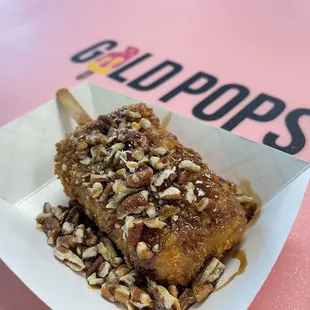 Fried ice cream with pecans &amp; black sugar syrup