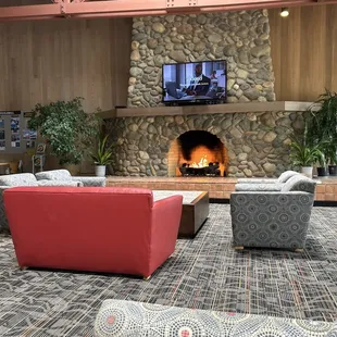 Common area with fireplace and couches