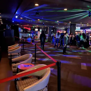 a line of people in a casino