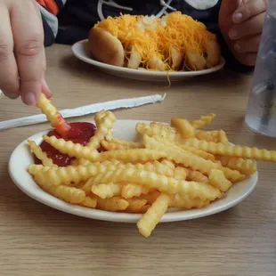 Hot and crispy crinkle cut fries.