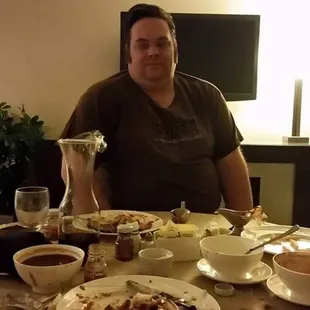 Me enjoying a wonderful meal from Room Service.