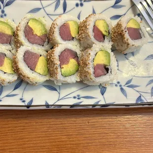 Tuna avocado sushi roll.
