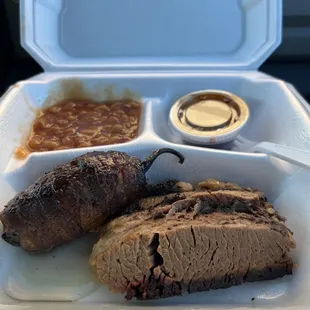 Brisket, baked beans,Twinkie, and sauce