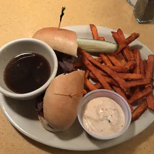 Pot roast sandwich w/sweet potato fries. One of the best French Dip-type sandwiches I&apos;ve had with piping hot crispy fries.