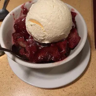 To-die-for homemade bread pudding. Tonight&apos;s flavor was red raspberry with ice cream (extra). Flavor changes daily. Big enough to split.