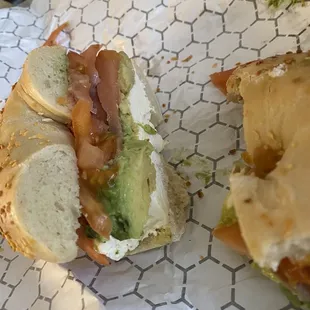 Garlic bagel with tomato, lox, avocado, cream cheese