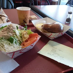 The Israel Special is any bagel plus tuna or egg salad, comes with sprouts lettuce tomato red onions  hummus baba ghannoush. Big lunch!