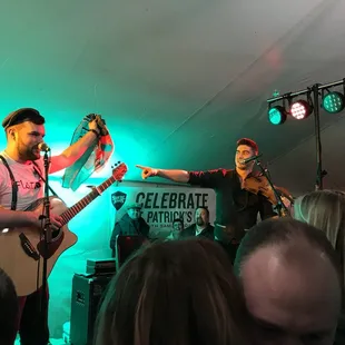 a band performing in a tent