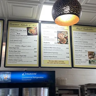 menus on the wall of a restaurant