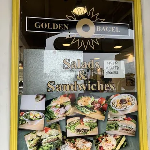 a display of sandwiches and salads