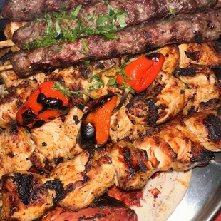 grilled meat and vegetables on a platter