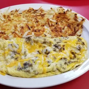 Sausage and cheese omelet w biscuit n gravy on the way