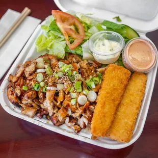 a meal in a styrofoam container