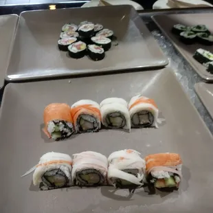a variety of sushi rolls