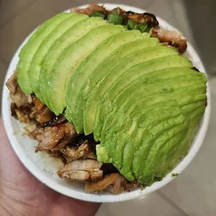 Medium chicken teriyaki bowl with added avocado.