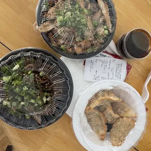 One side of chicken, side of beef and a side of gyoza.