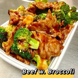 beef and broccoli on a white plate