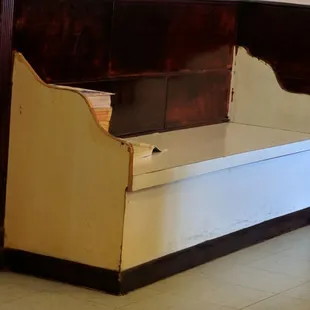 Seat I can only assume for customers waiting for their order to finish cooking