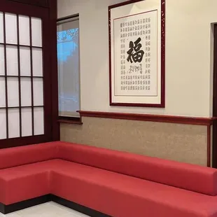 a red couch in a restaurant