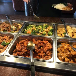 a buffet with a variety of food items