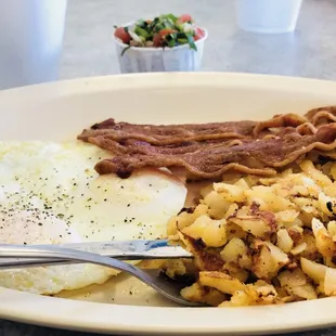 Bacon and eggs special with some fresh salsa $5.99